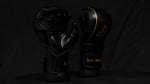 Load image into Gallery viewer, Black & Gold MMA Sparring Gloves