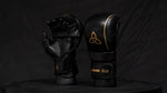 Load image into Gallery viewer, Black &amp; Gold MMA Sparring Gloves
